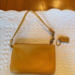 Coach Tan Leather Clutch with Tassel